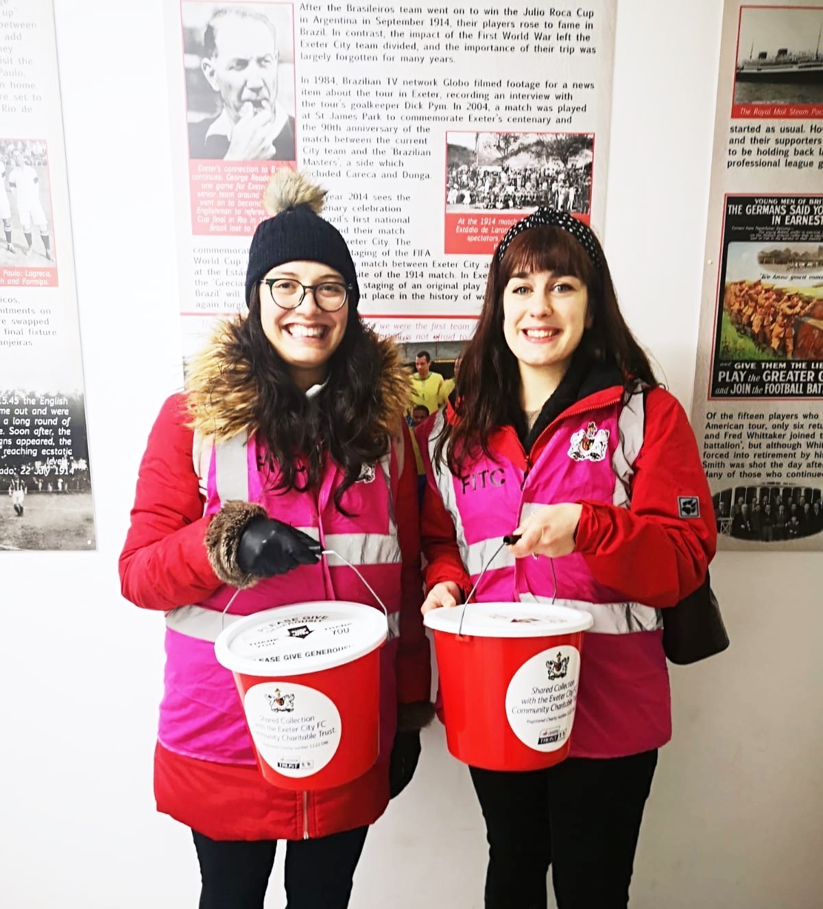 Sarah Heath and Antonia D'Alessio collecting bucket donations at Exeter City Football Club