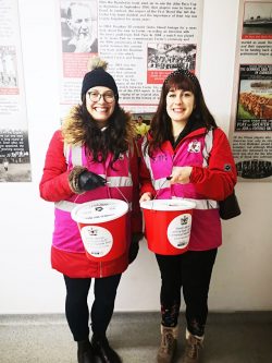 Sarah Heath and Antonia D'Alessio collecting bucket donations at Exeter City Football Club